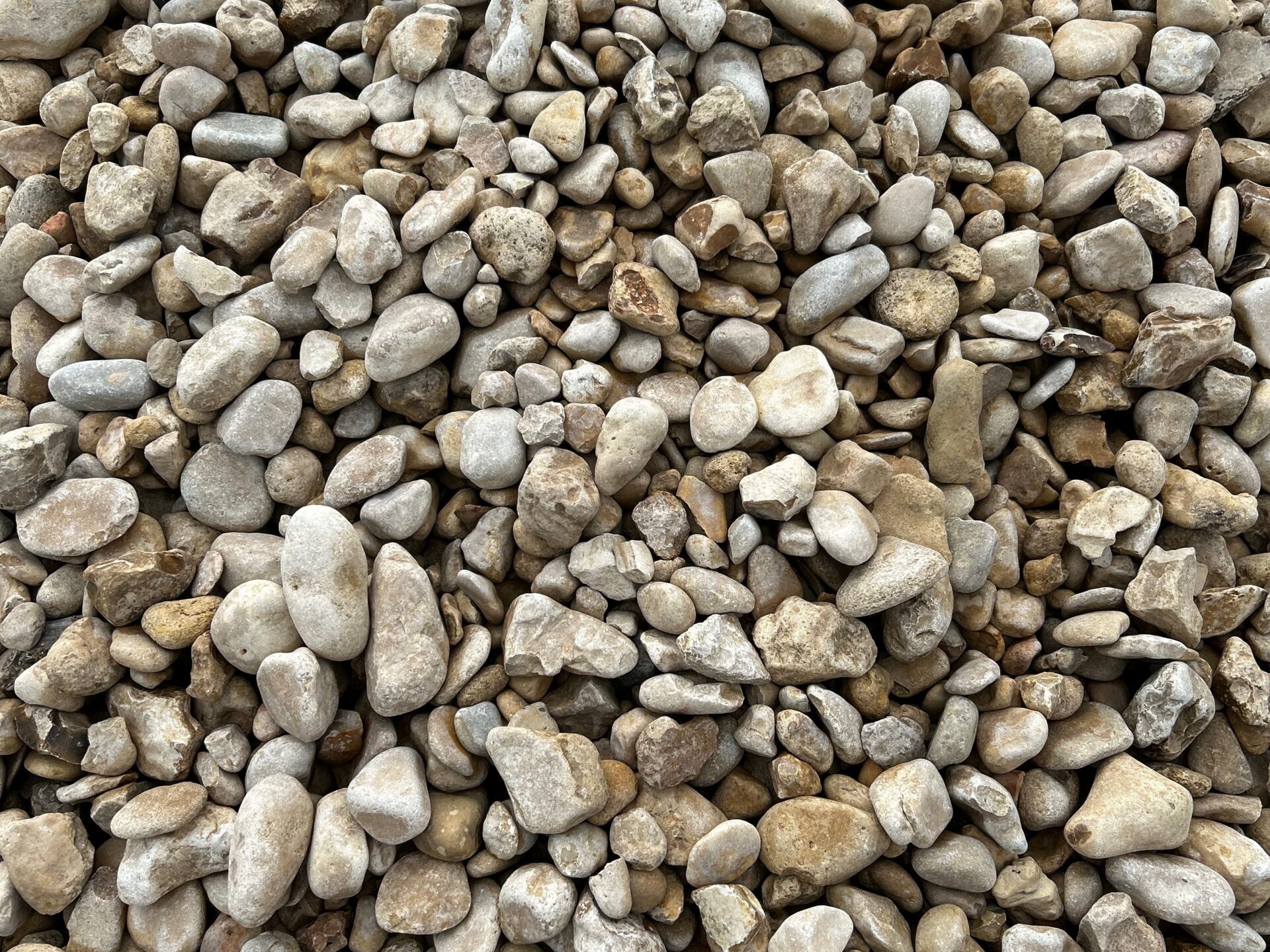 tan/brown river rock sized 1-4 inches