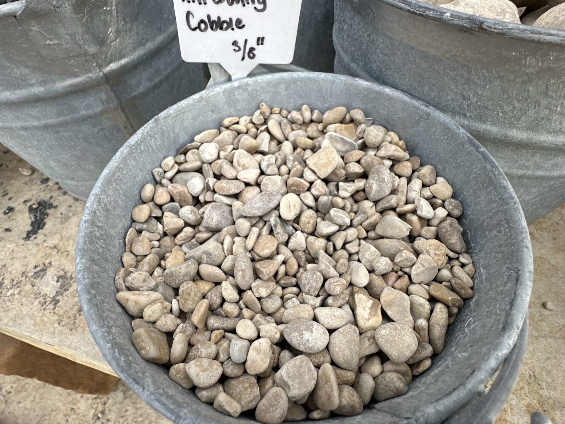 tan smooth pea gravel for playgrounds
