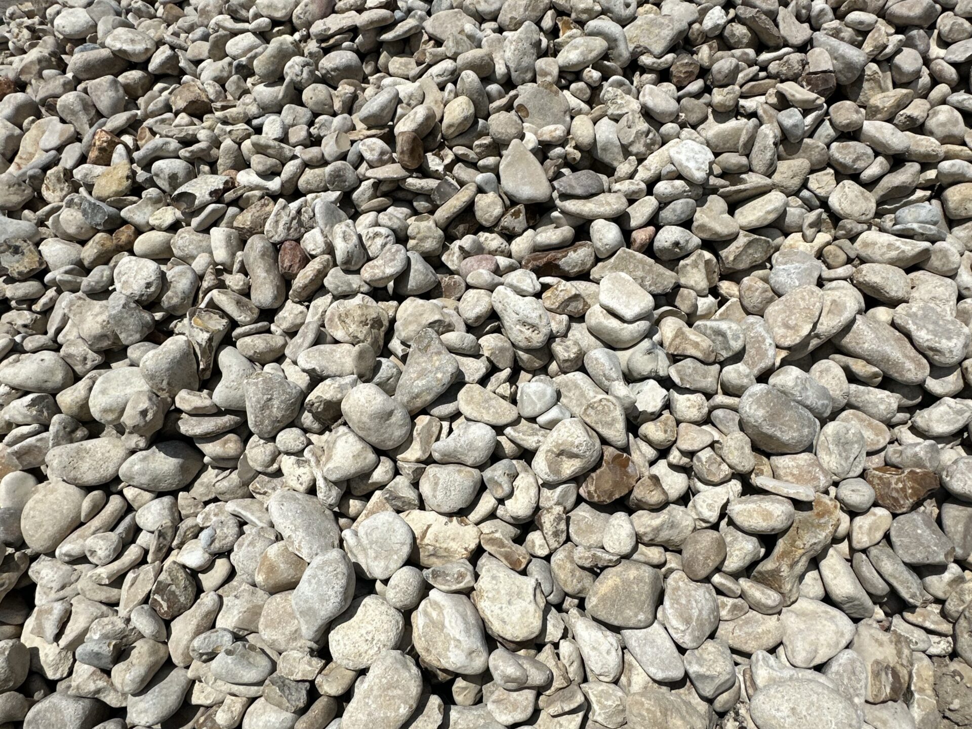 creme/tan river rock sized 1-2 inches
